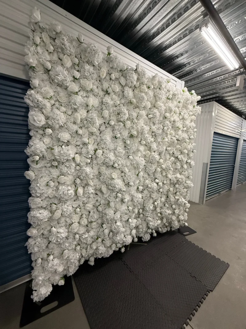 Luxury white flower wall backdrop for photo booth rental and event styling