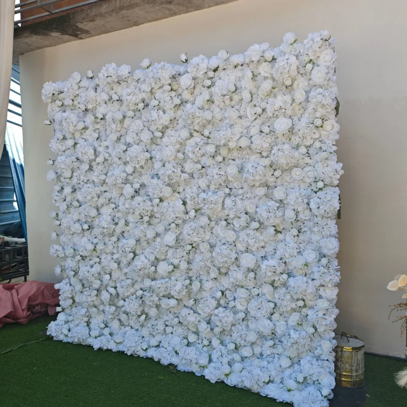Angled view of white flower wall backdrop for weddings and special events